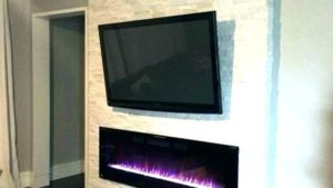 TV Wall Mount on a Stone Fireplace